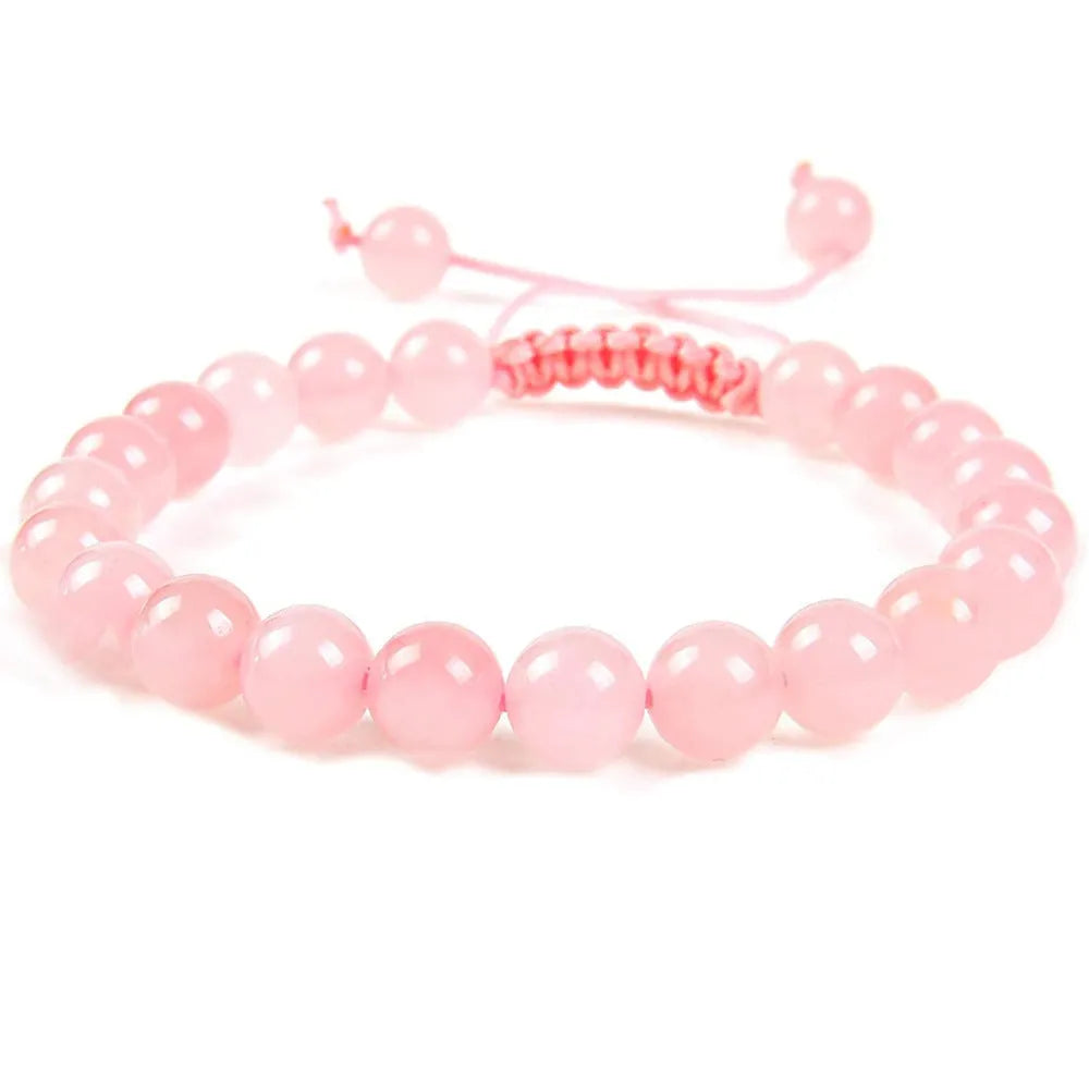 Women's flat knot braided bracelet hand-woven from aquamarine stone with geometric patterns.