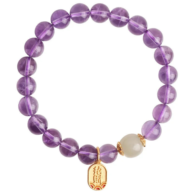 Amethyst purple crystal bracelet with 8mm geometry-shaped beads on wrist
