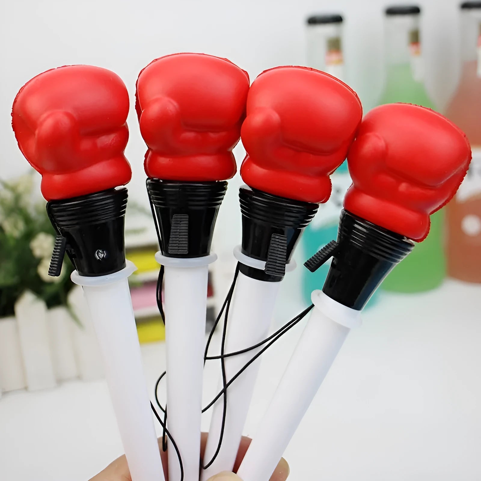 Four boxing pressure relief pens with press ejection mechanism and 0.7mm bullet tips