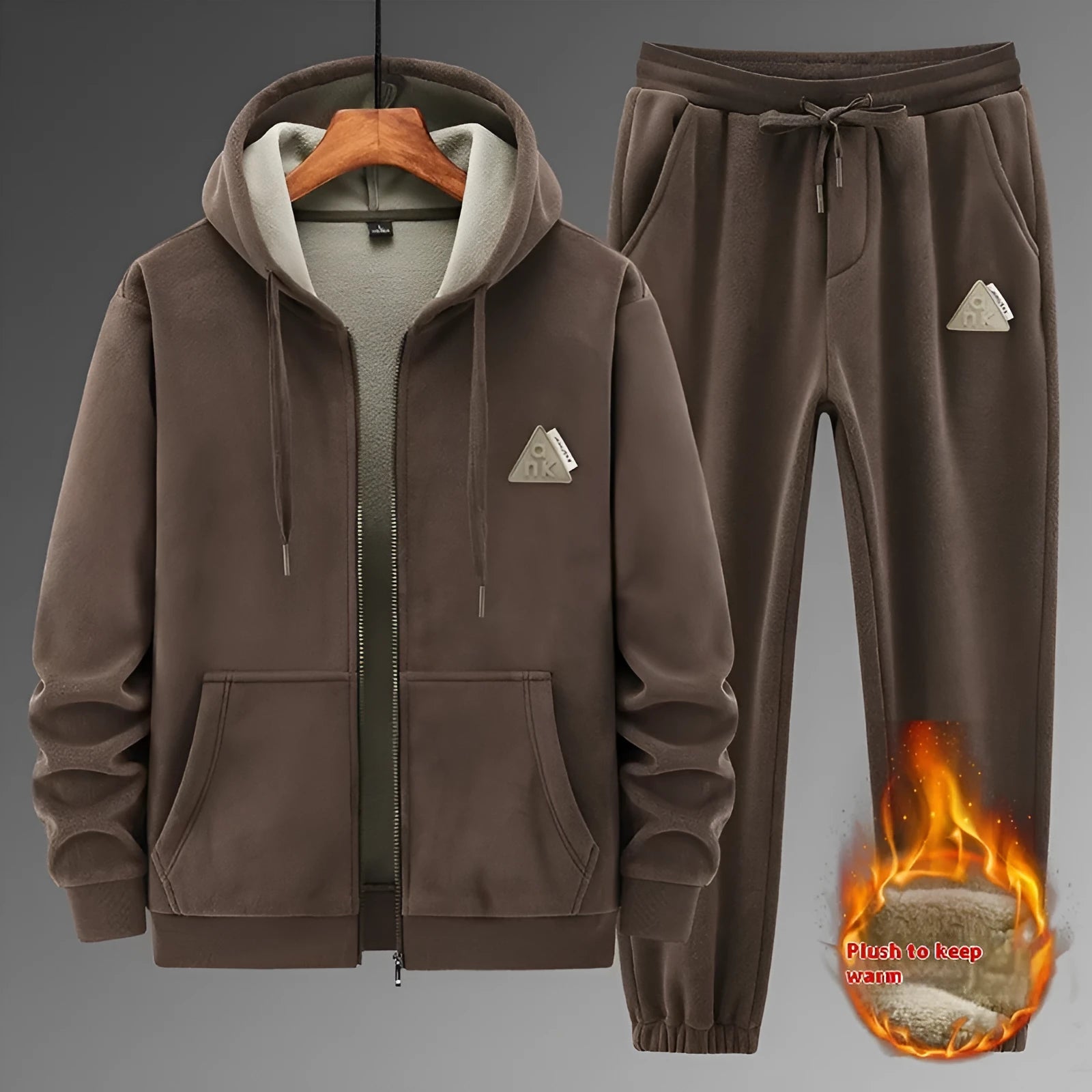 Grey cashmere hooded sweater and matching pants casual sports suit laid flat.