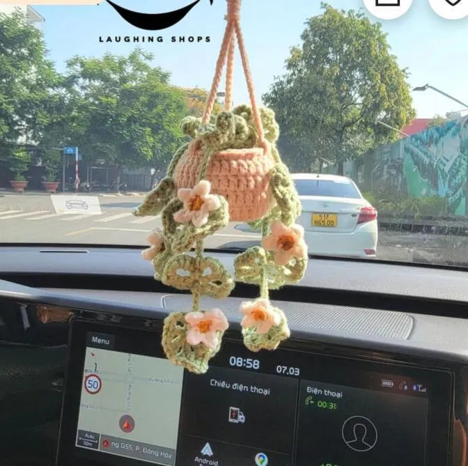 Green and white knitted wool car plant decoration with 8cm base and 25cm hanging rope