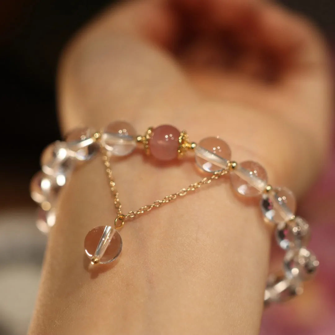 Chinese style geometric crystal bracelet with cat eye obsidian stone and auspicious patterns.