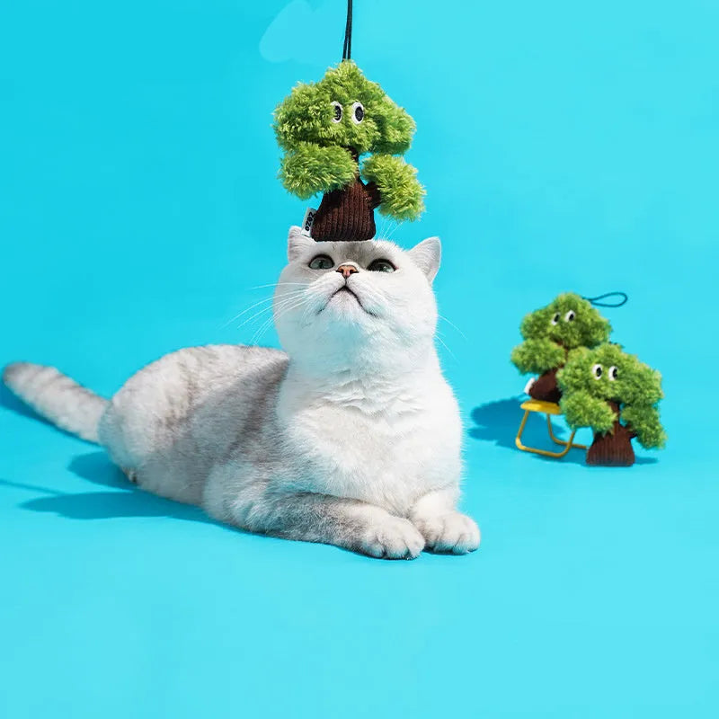 Pine tree-shaped cat toy bag pendant infused with cat mint, shown in three sizes