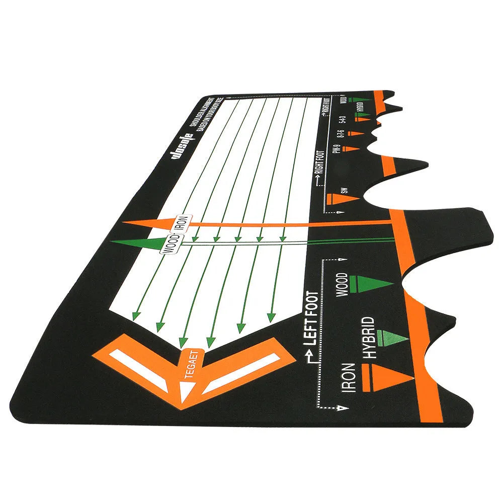 Black neoprene golf swing stance alignment pad on grass