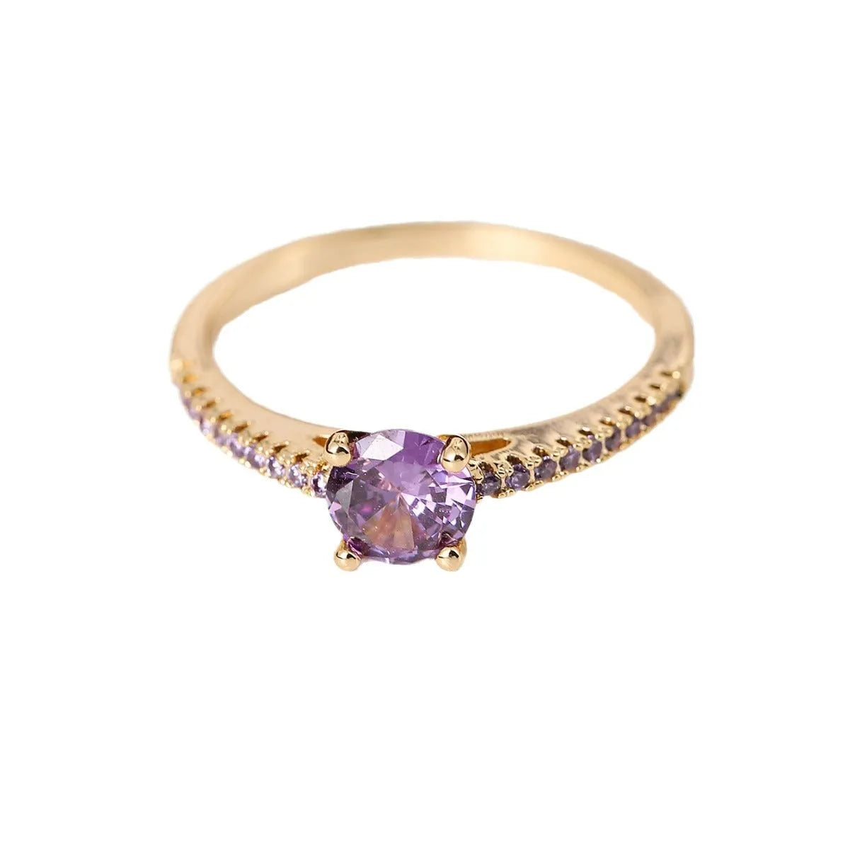 Geometric hexagon zircon ring in copper on a grey background, showing electroplated gold rose red finish.