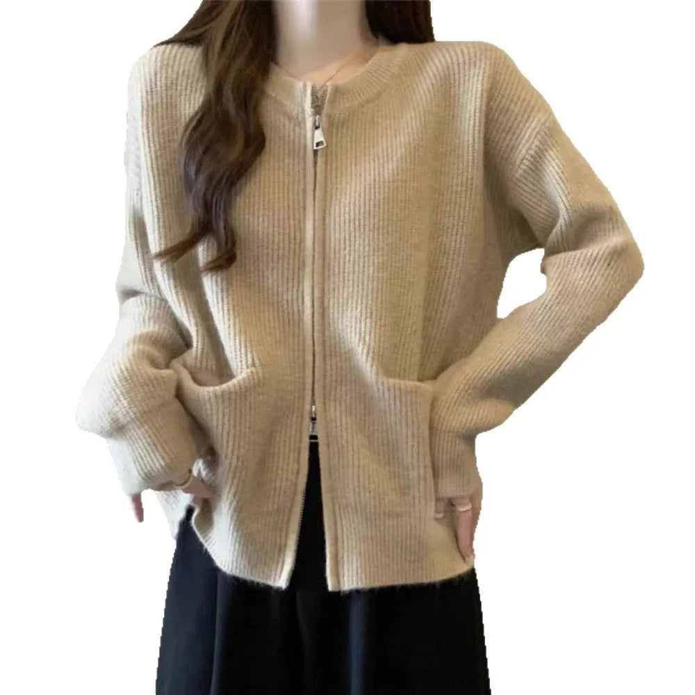 Beige viscose fibre soft sweater coat with long sleeves and open cardigan front.