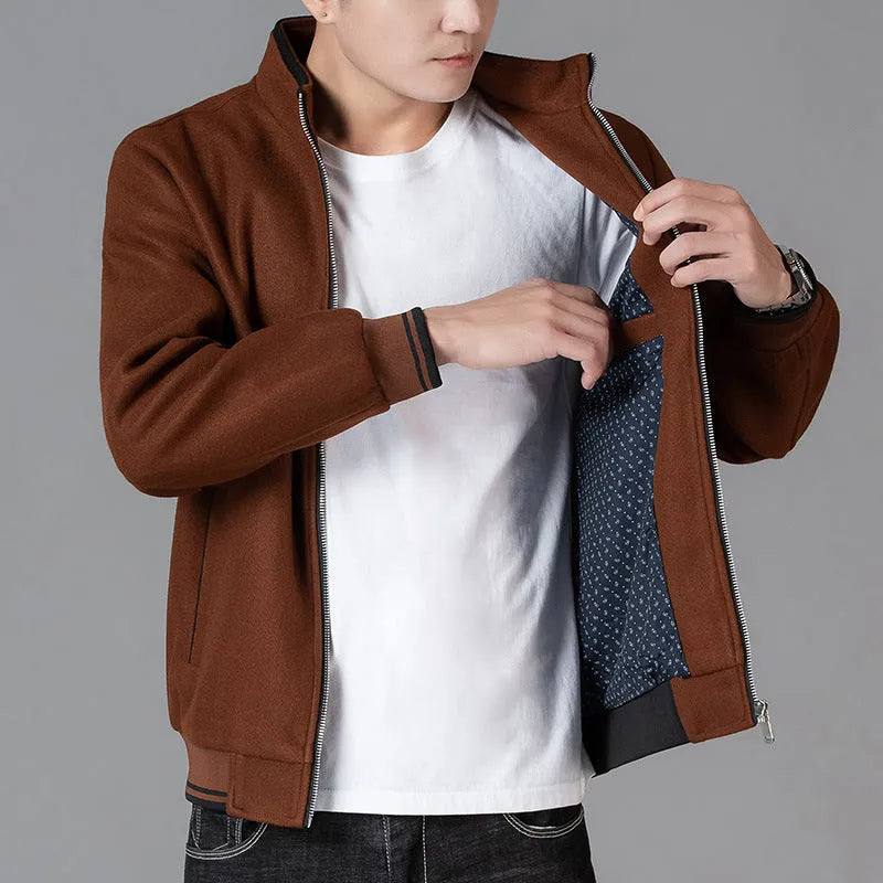 Men's grey sports-style fleece jacket with long sleeves and a stick pocket.
