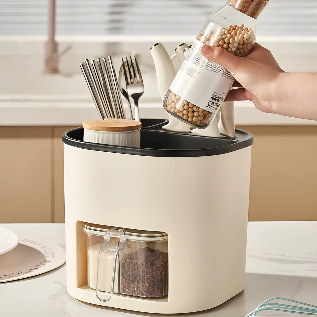 White rotating kitchen storage container with cutlery holder and four-section spice box organiser.
