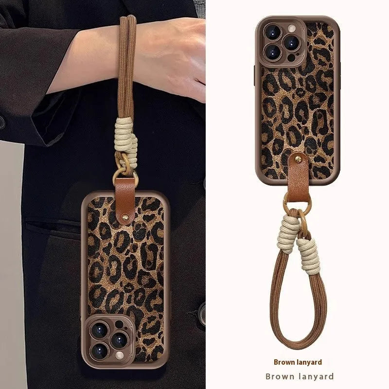 Brown leopard print silicone iPhone case showing the integrated lanyard loop on the corner.
