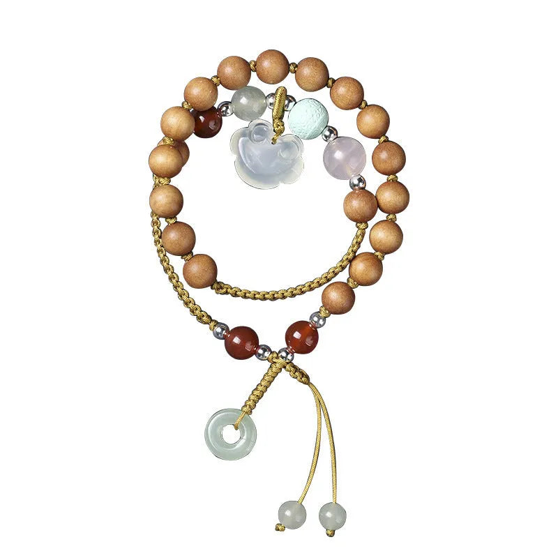 Hand-woven women's ebony bracelet with sandalwood fragrance and traditional double ring design