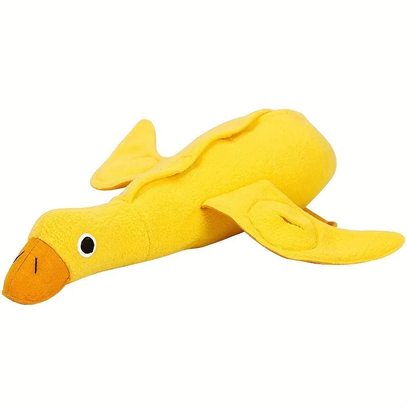 Yellow plush teddy bear dog toy with an attached duck doll, featuring a squeaker and treat compartment.