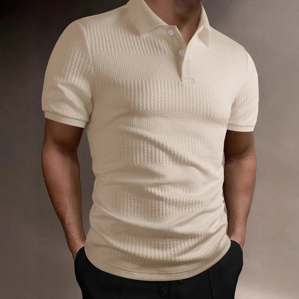 Man wearing a striped loose-fit polo shirt in a light blue colour, suitable for business casual summer wear.