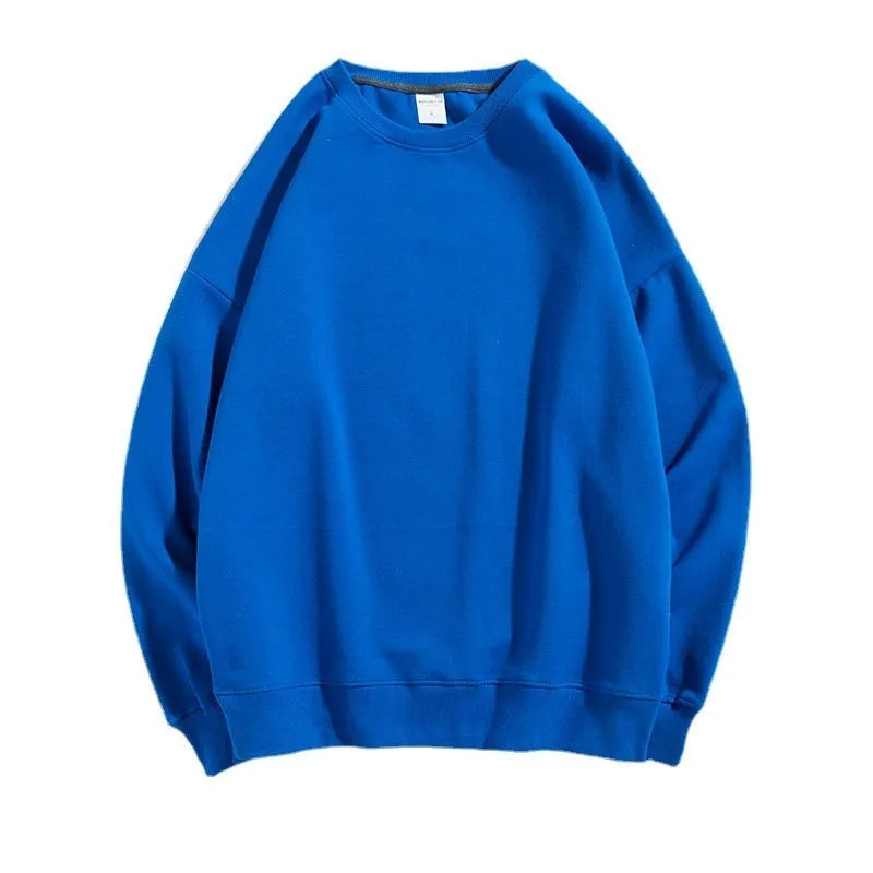 Women's loose fit cotton off shoulder sweater in a solid colour, showing round neck and long sleeves.