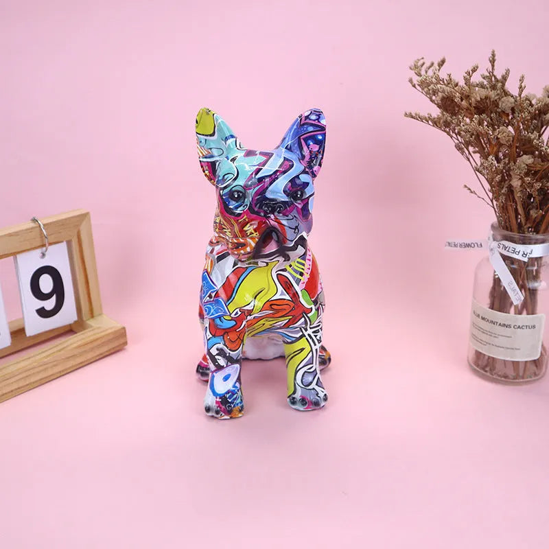 Modern graffiti-colour French Bulldog resin statue on a shelf