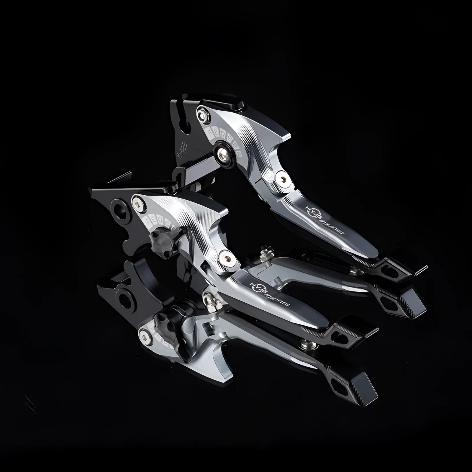 Pair of anodised aluminium motorcycle brake and clutch levers with six-speed adjustable length mechanism