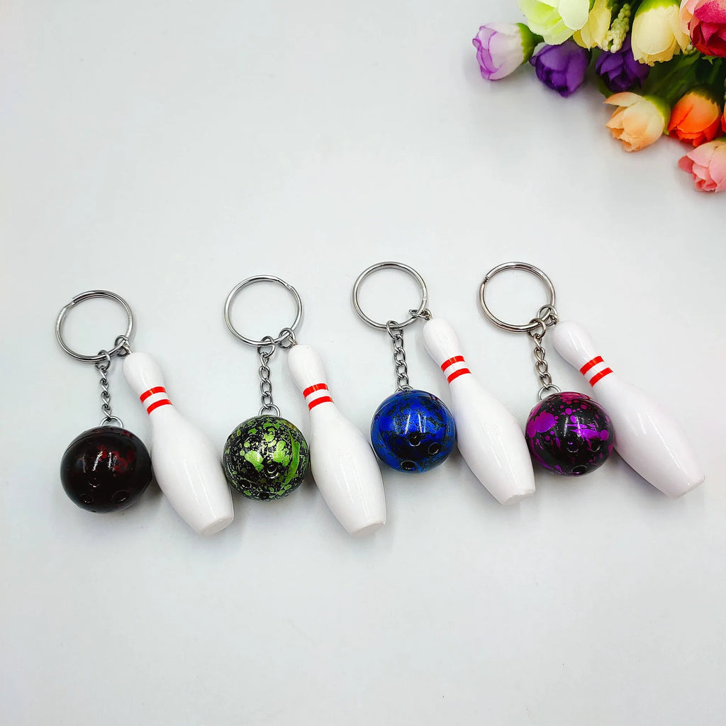 Mini bowling ball keychain pendant in dark red, blue, purple, or green colours