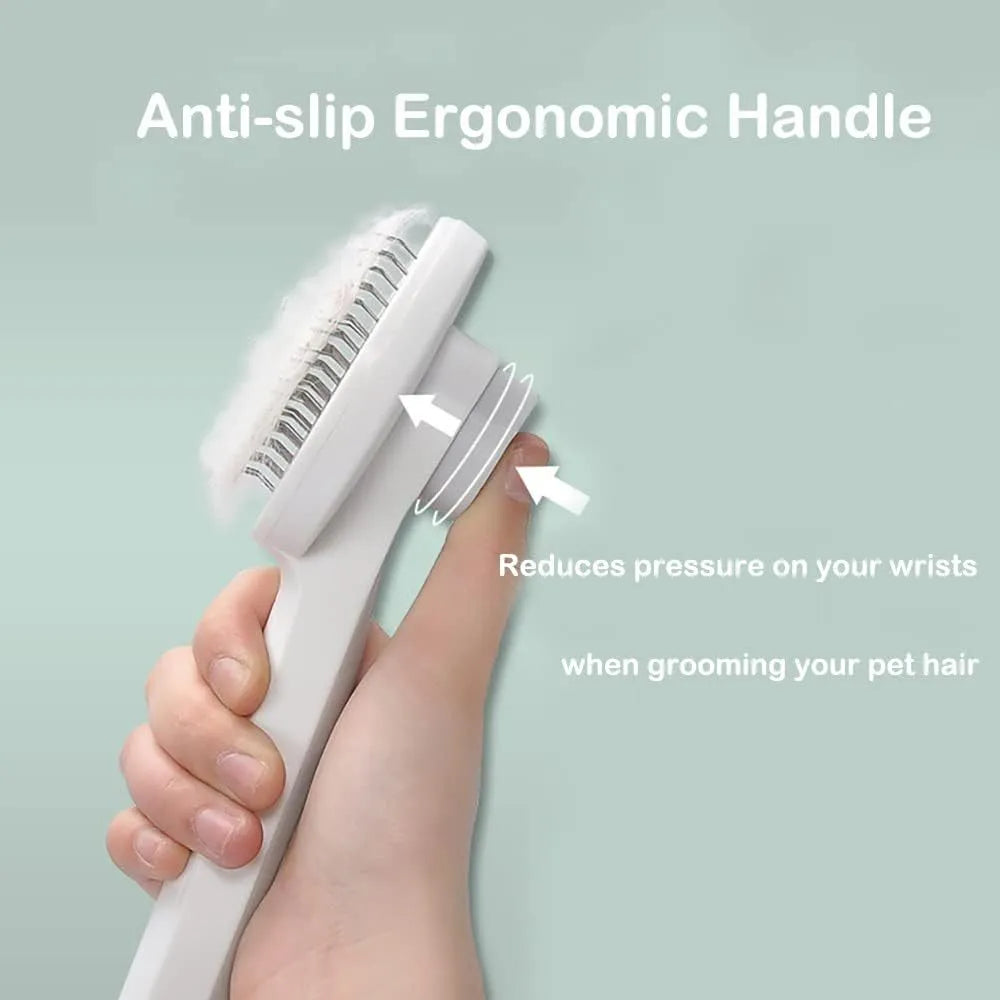Self-cleaning pet brush with rubber handle and massage needles for cats and dogs