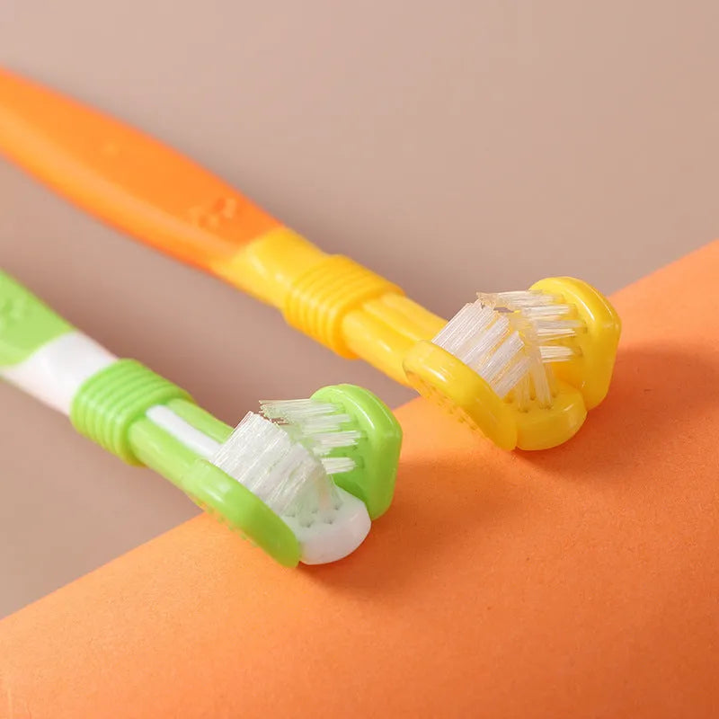 Pet toothbrush with angled head in assorted colours including orange, dark green and blue pink