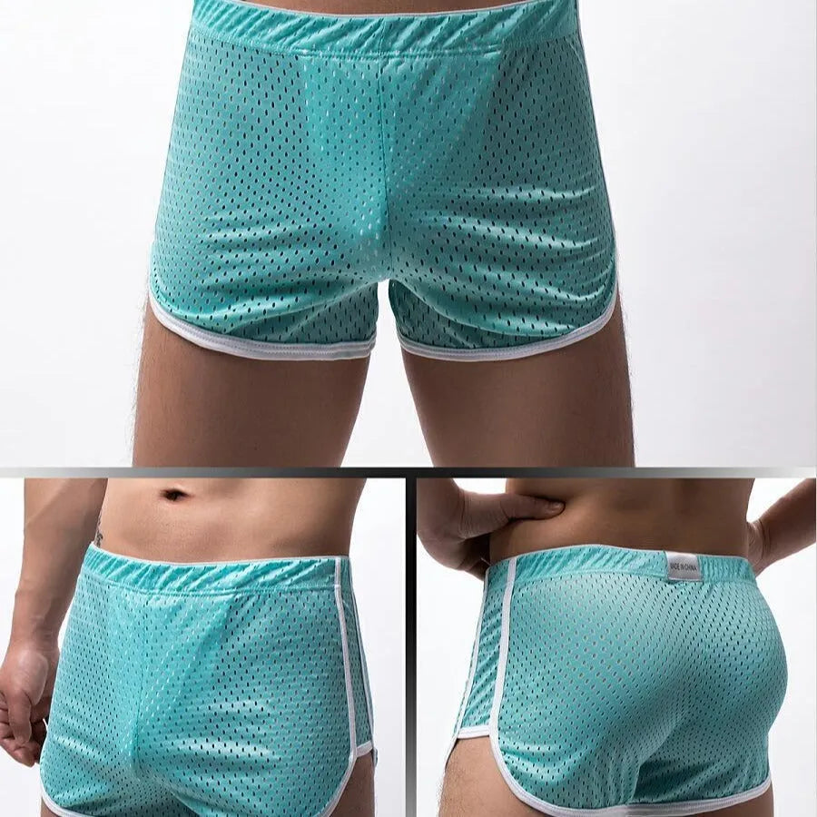 Men's knitted cotton boxer shorts in black, shown flat.
