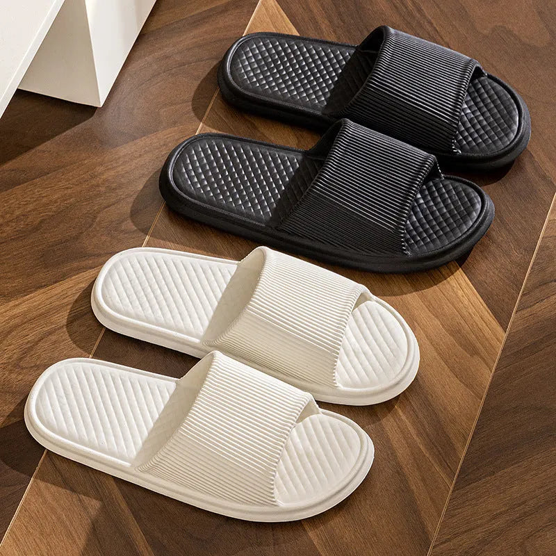 Pair of solid colour rhombus striped non-slip EVA foam indoor slippers