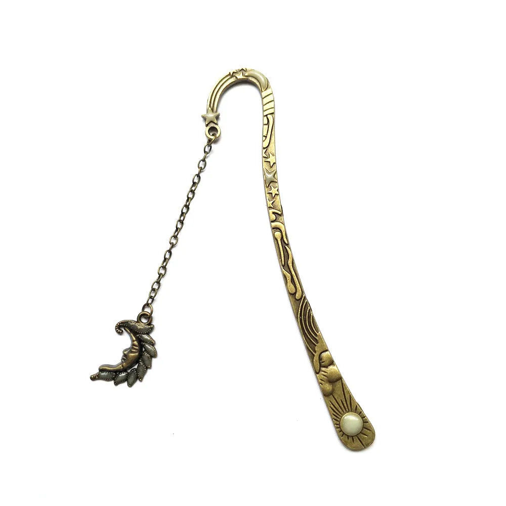 Retro five-pointed star metal bookmark glowing with celestial sun moon stars design