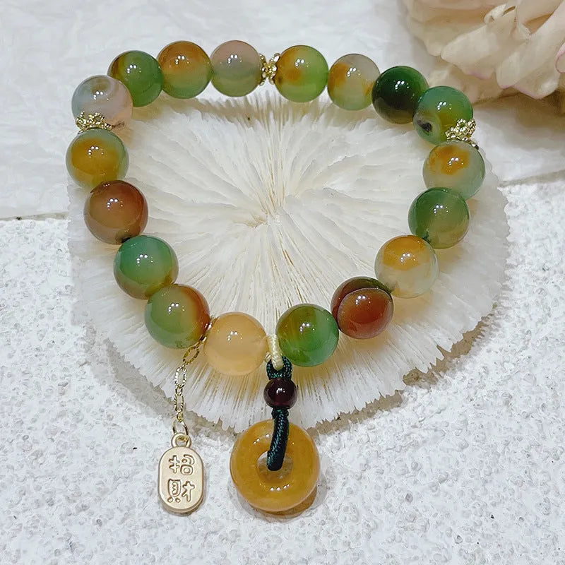 Yellow peacock agate women's bracelet with peace buckle clasp and old mine topaz accents