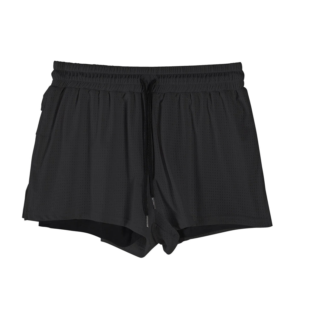 Man wearing black quick-dry nylon summer shorts with a mid-waist design.