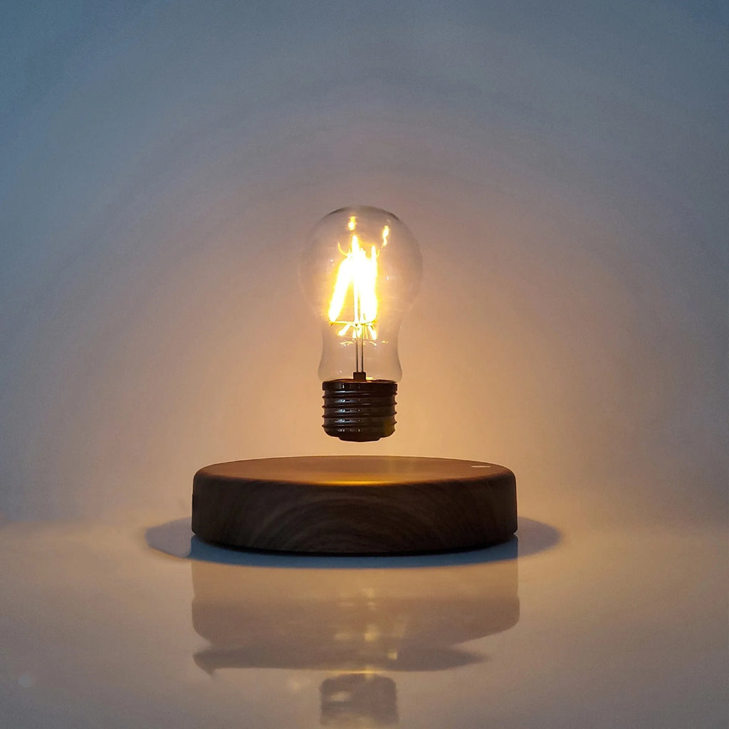 Magnetic levitation bulb night light floating above solid wood colour base with plug adapter options