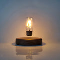 Magnetic levitation bulb night light floating above solid wood colour base with plug adapter options