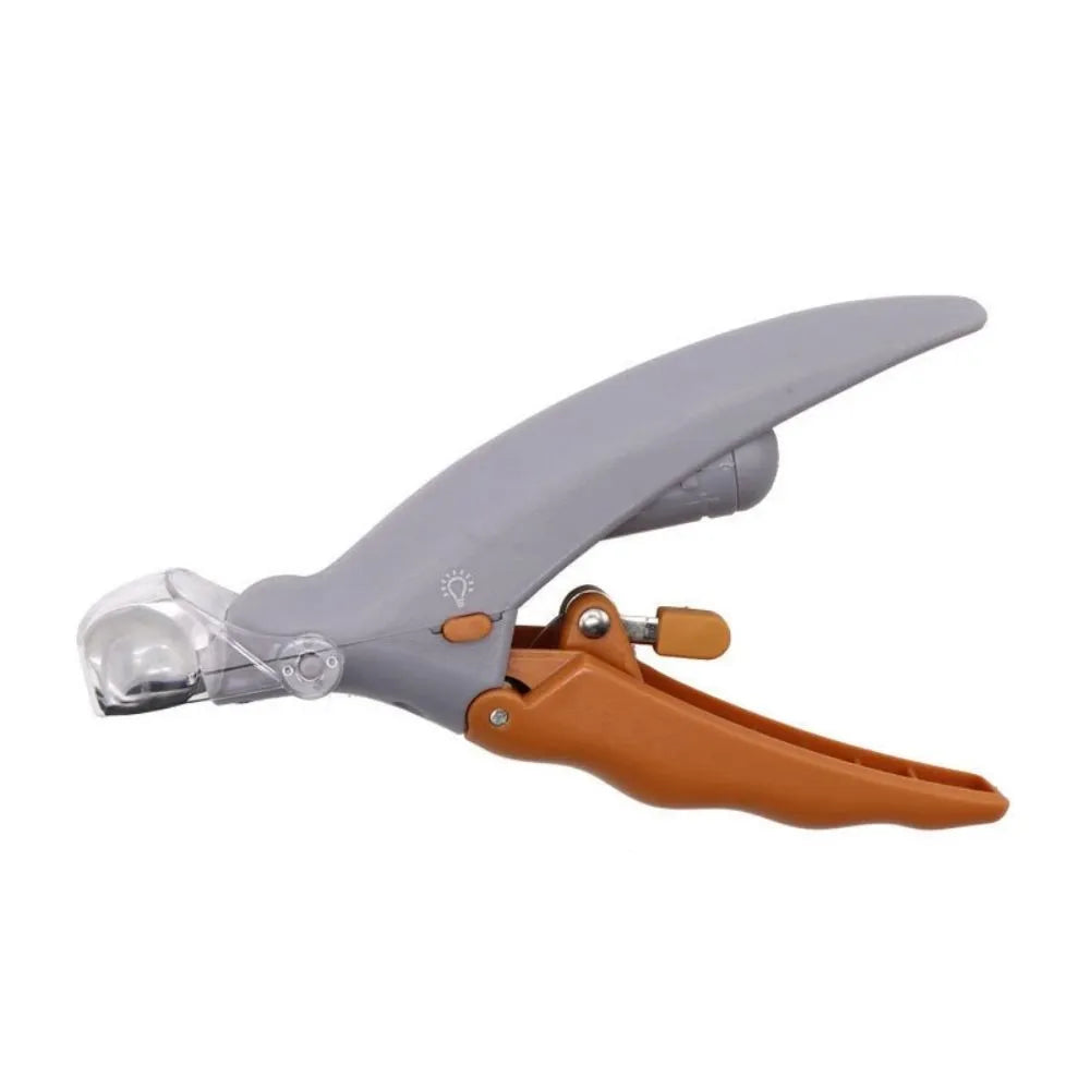 Yellow pet nail clipper for dogs and cats with built-in LED light and magnifying lens on handle.