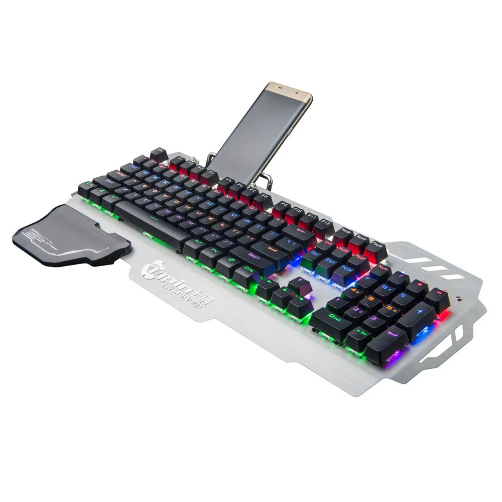 Silver metal panel professional gaming keyboard with wrist splint accessory on desktop