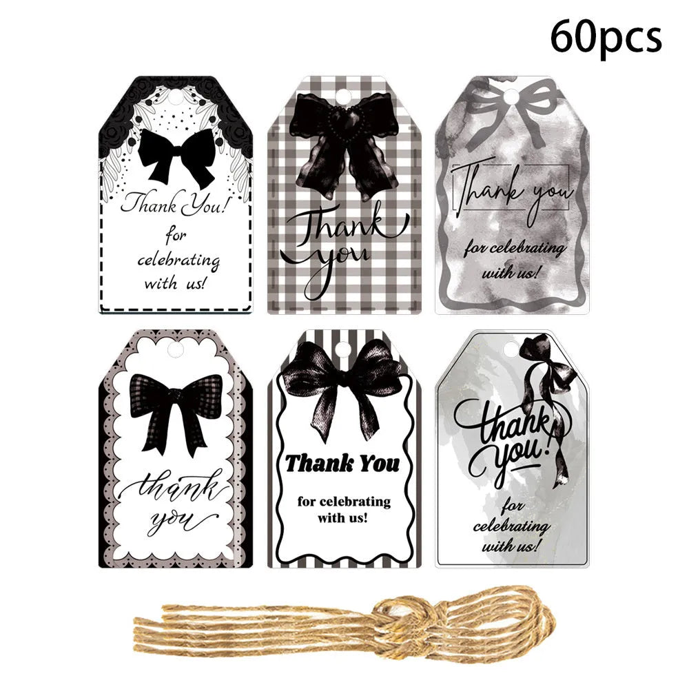 Three styles of birthday party gift tags with bowknot designs and hemp rope ties