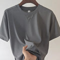 Men's heavyweight waffle-knit short-sleeve t-shirt in a solid colour, shown on a hanger.