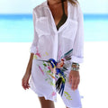 Women's long sleeve cardigan with 3D printed bird and flower painting pattern, on a hanger.