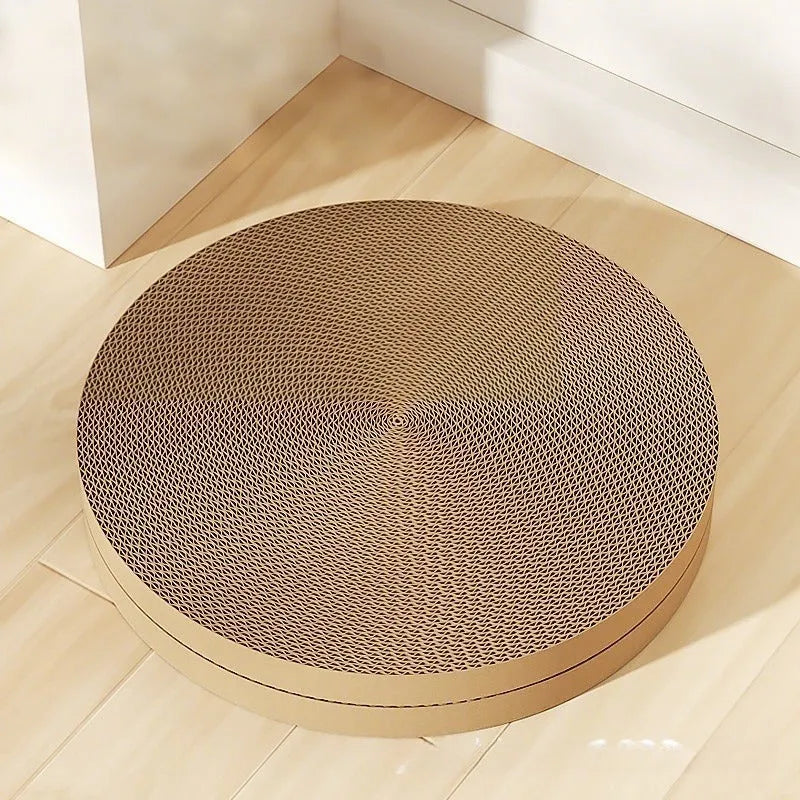 Round green cat scratching board with corrugated cardboard surface measuring 55 cm across
