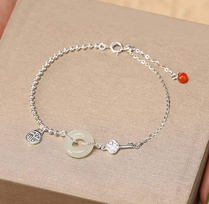 Women's 925 silver Hetian jade bracelet with Chinese geometric design and peace buckle