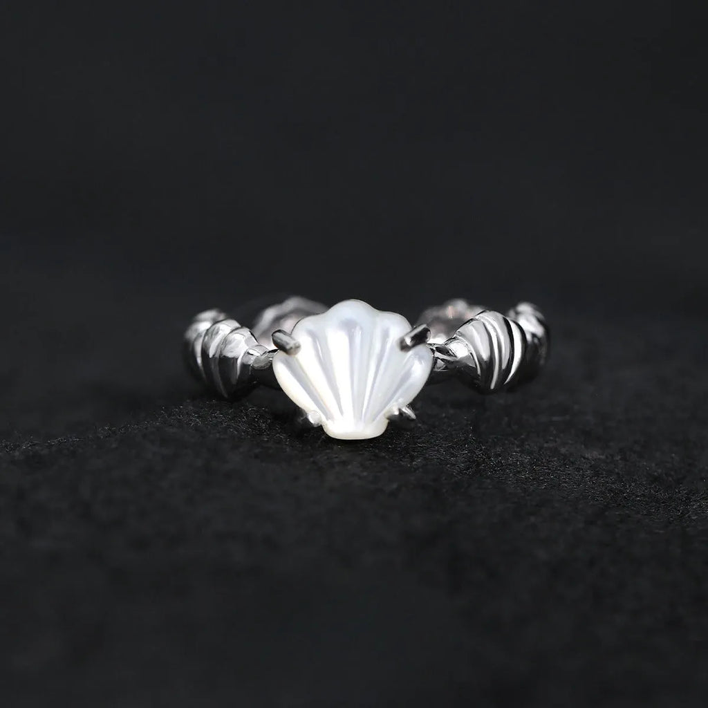 Women's adjustable silver ring with a shell tiger eye stone and white gold electroplating.