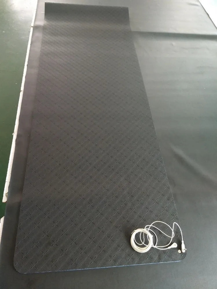 Blue conductive grounding yoga mat with plants pattern showing integrated wire and 182x61cm dimensions
