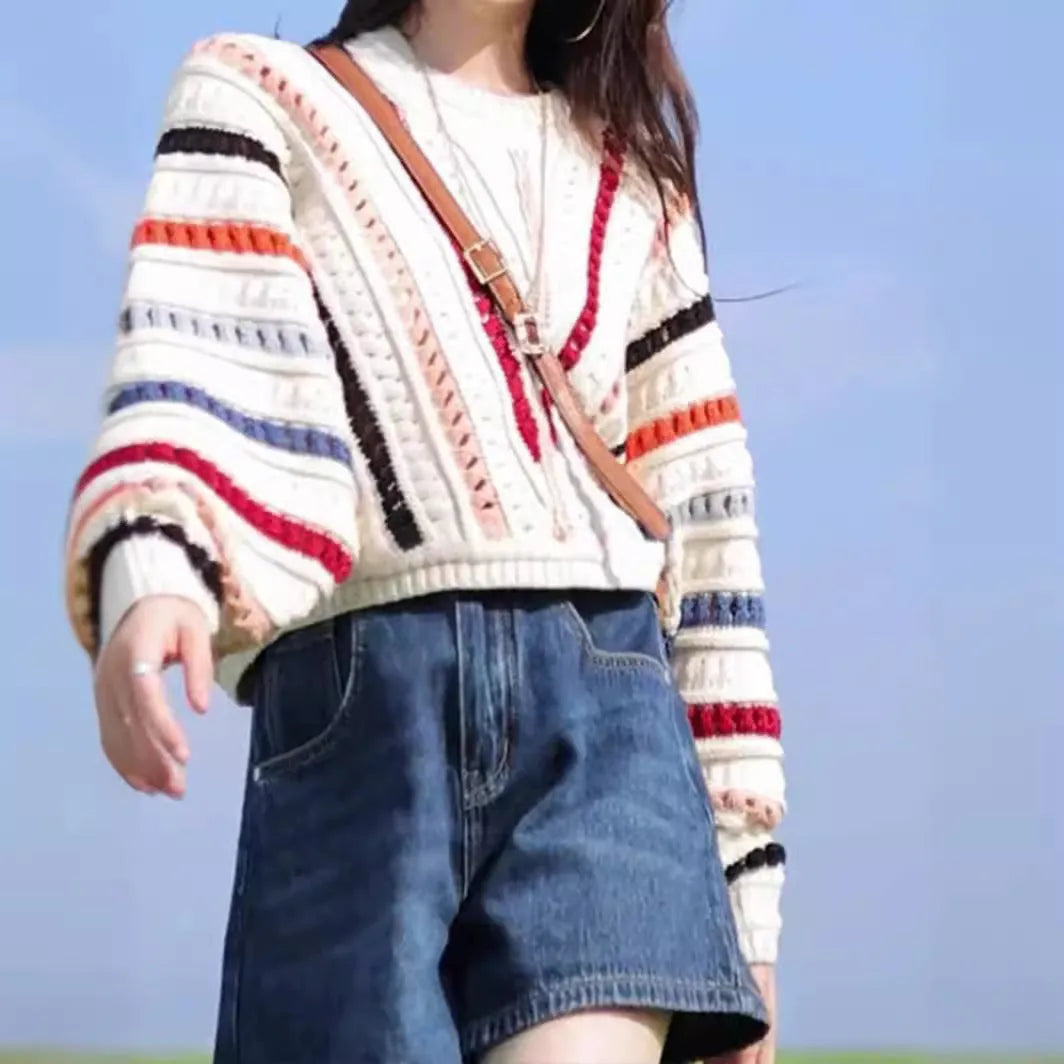 Rainbow striped hollow sweater with batwing sleeves and round neck in poly-cashmere blend