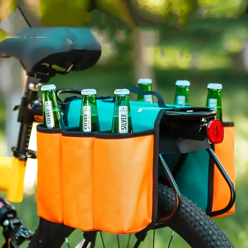 Black double-sided bicycle bag mounted on a bike carrier, showing two compartments.
