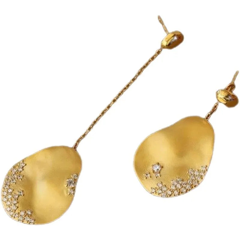 Asymmetric floral women's earrings with zircon stones in gold or silver finish, Chinese style design.