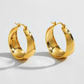 Curved widened stainless steel earrings with titanium steel in gold or steel colour, 25mm or 30mm sizes