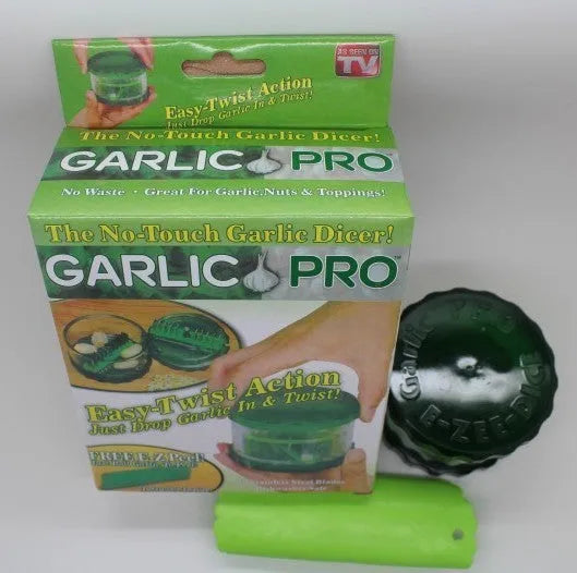 Green transparent PP plastic garlic peeler kitchen gadget on a countertop
