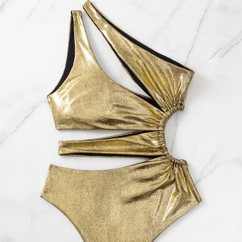 Women's gold backless one-piece swimsuit with sleeveless design and solid colour