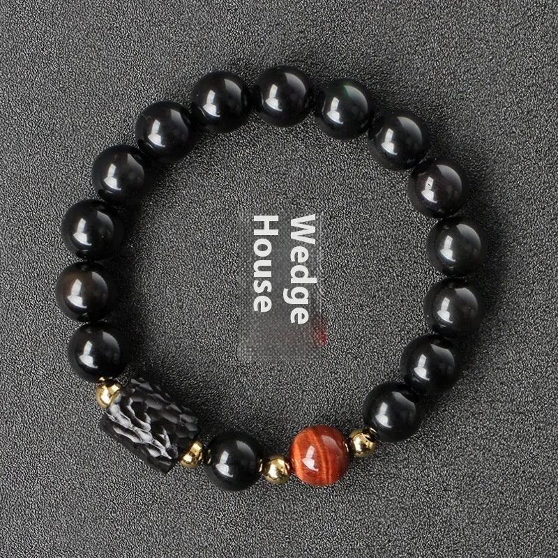 Handmade obsidian bracelet with red and yellow tiger eye beads in circle design