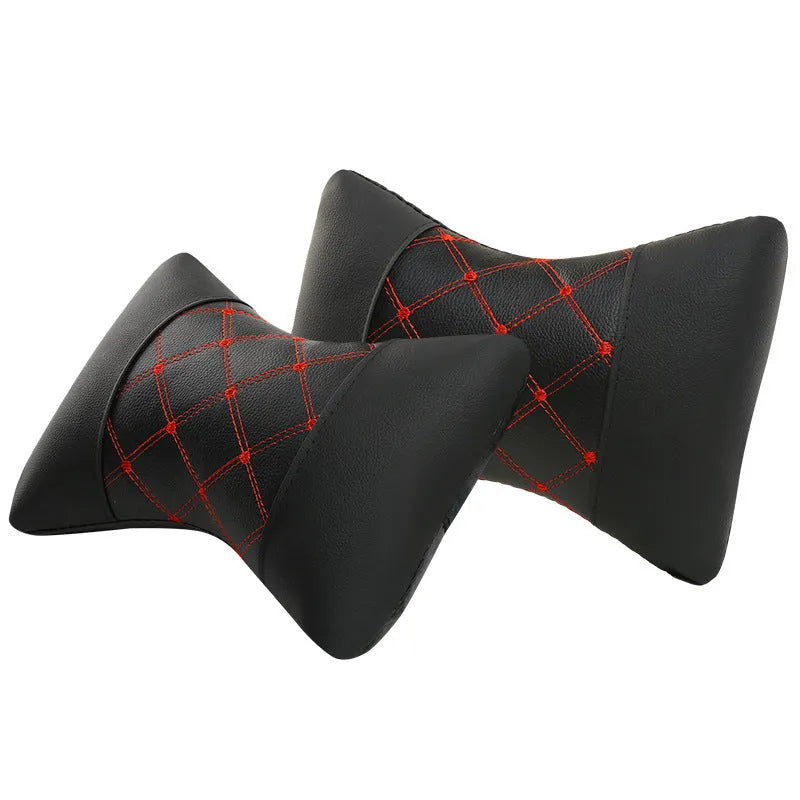 Black quilted artificial leather car headrest pillow for cervical neck support.