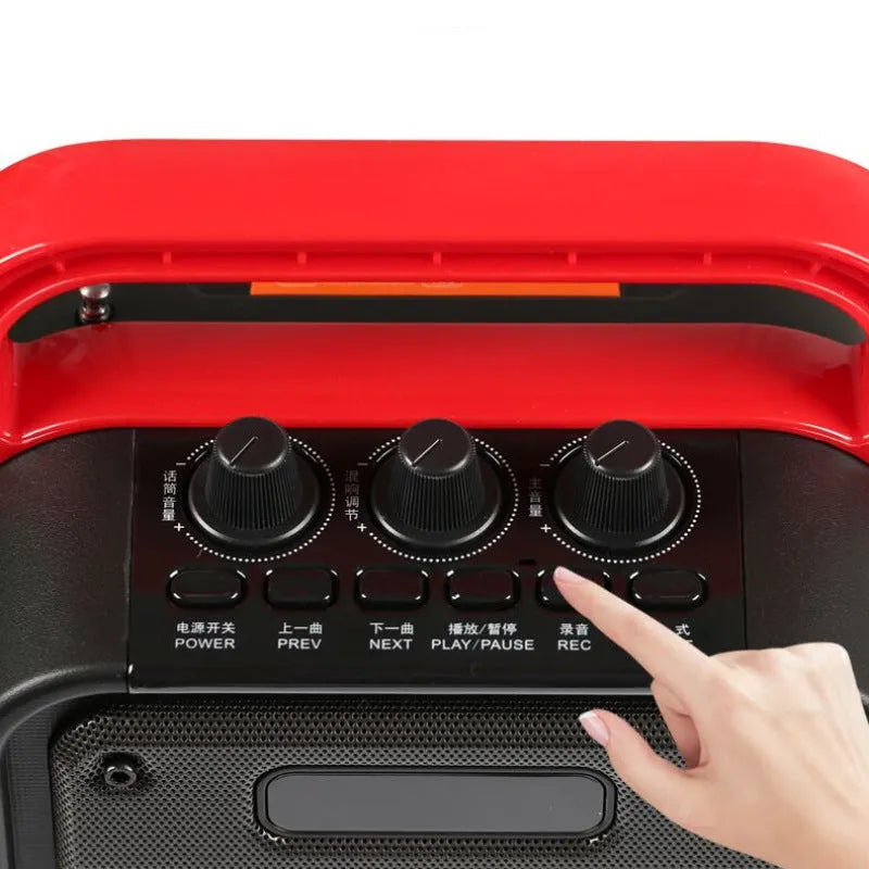 Black MS62AI portable Bluetooth speaker with wireless microphone and control knob on top.