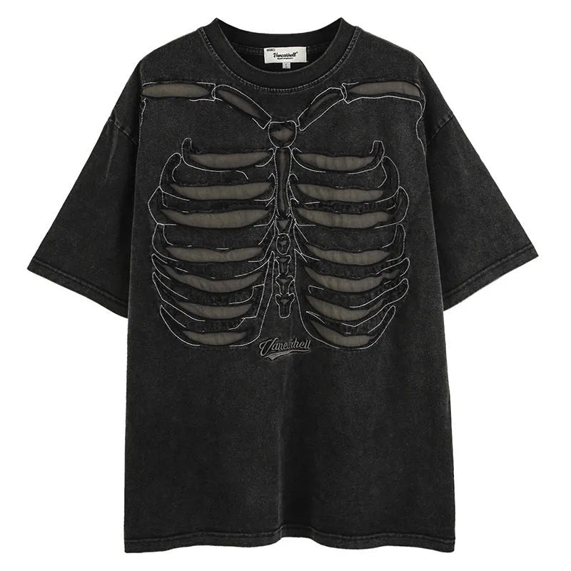 Man modelling a brown loose-fit cotton T-shirt with a printed skull graphic on the front.
