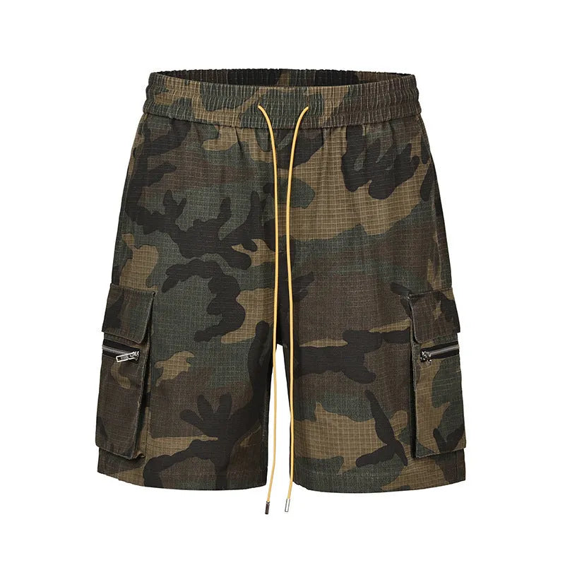 Men's camouflage cargo shorts with multiple pockets showing cropped length and mid-waist design