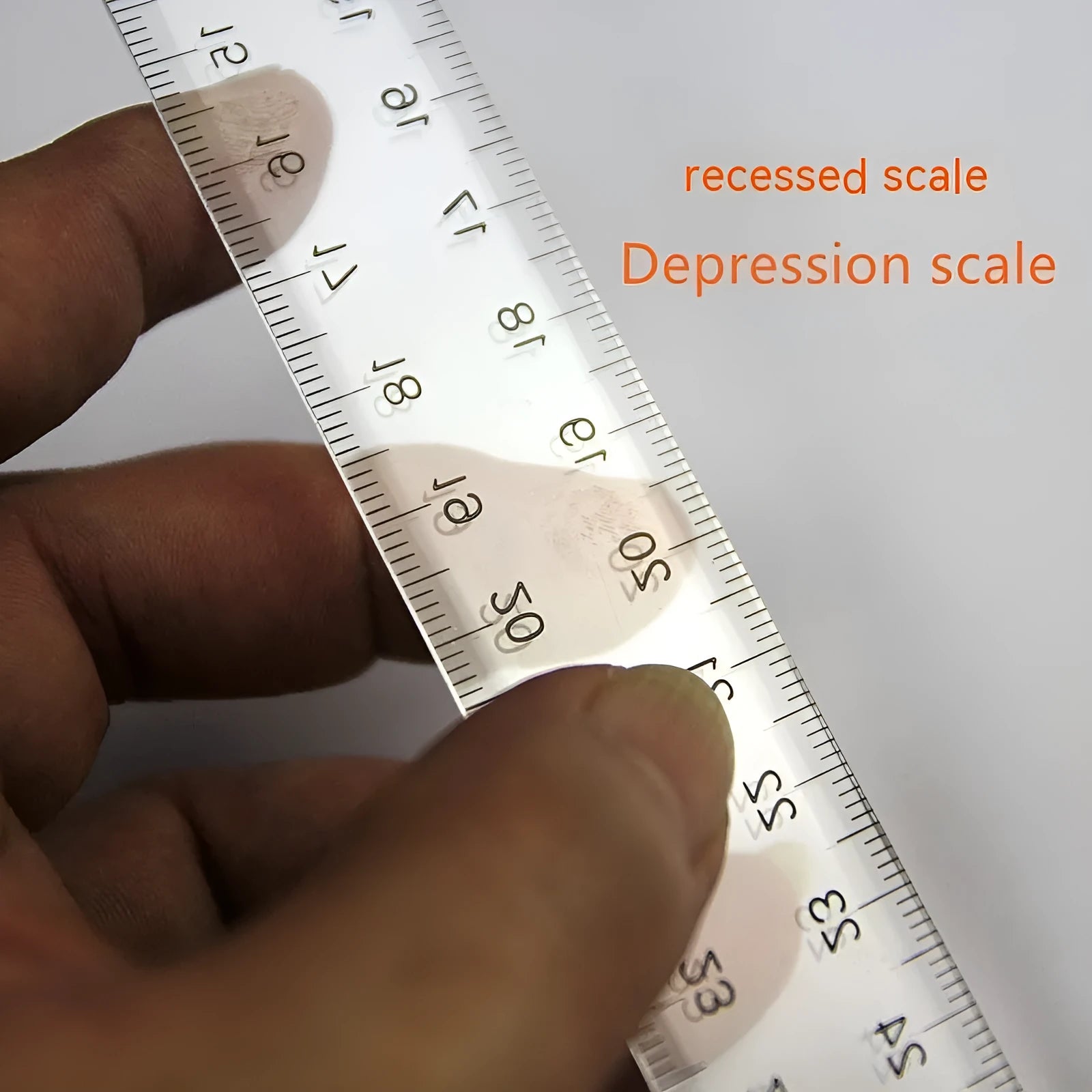 30cm plastic T-shaped ruler in transparent or orange with UK or dual-centimetre markings